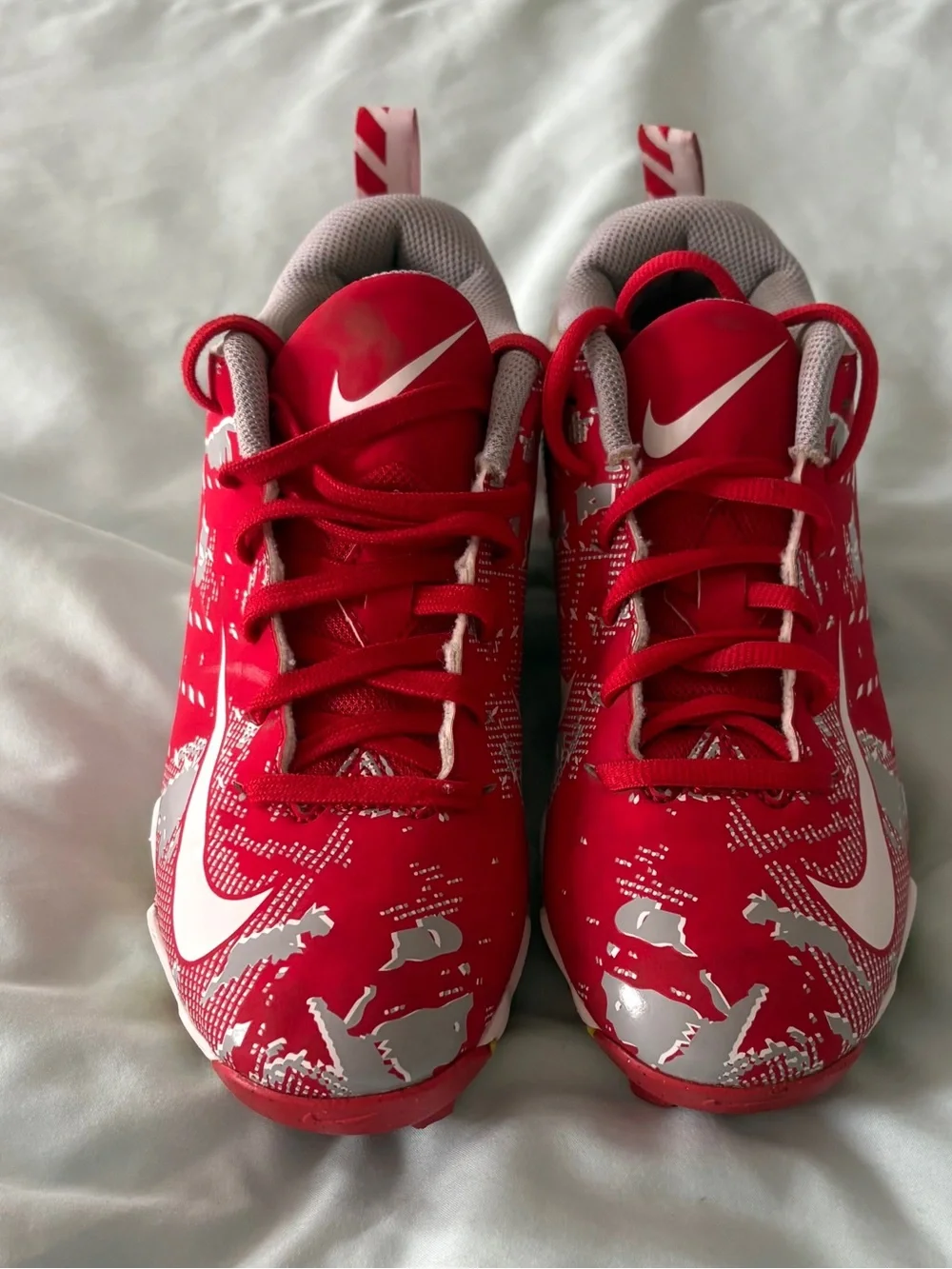 Nike Red and White Youth 4.5 Cleats with Yellow Sole Accents